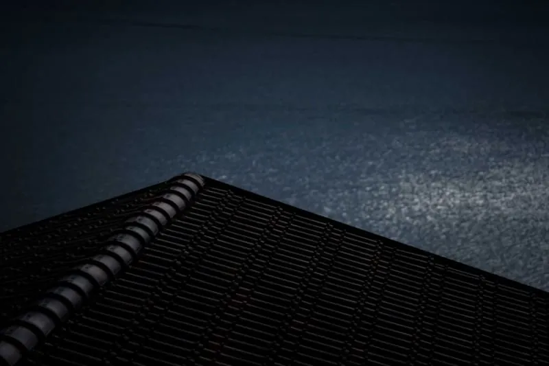 A flat roof with a dark waterproof membrane.