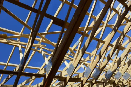 A newly installed tiled roof on a Melbourne home against a blue sky.