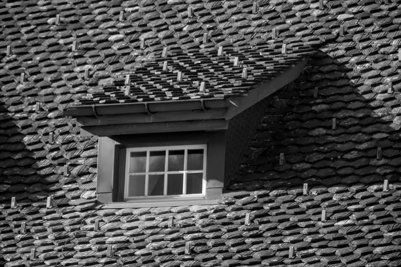 Skylights letting natural light into a room from the roof.