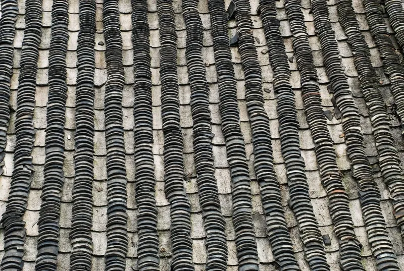 Close-up of natural slate roof tiles.